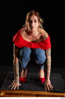 Daisy Lee 1 blue jeans dressed kneeling red high heels…